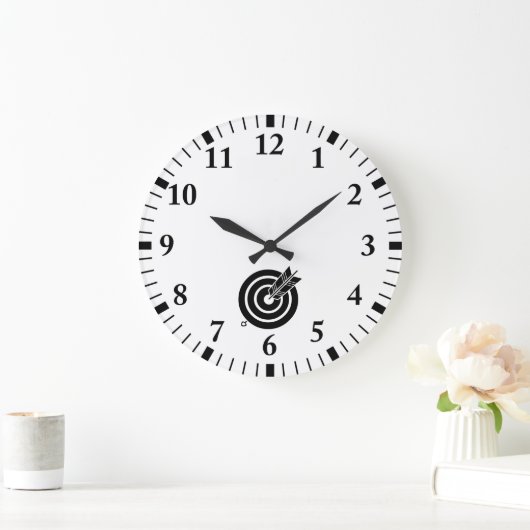 Pijl raakt een rond doel grote klok (Huis)