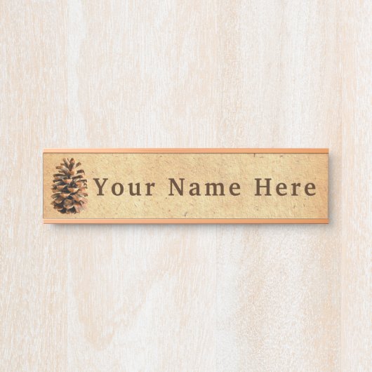 Pijnkloon op oud papier deurbordje (Voorkant)
