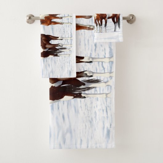 Pijnstokpaardjes in wintersneeuw bad handdoek (Insitu)