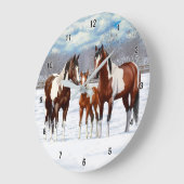 Pijnstokpaardjes in wintersneeuw grote klok (Hoek)