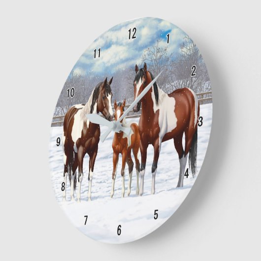 Pijnstokpaardjes in wintersneeuw grote klok (Hoek)