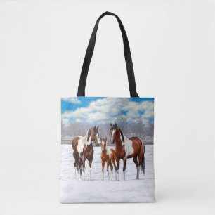 Pijnstokpaardjes in wintersneeuw tote bag