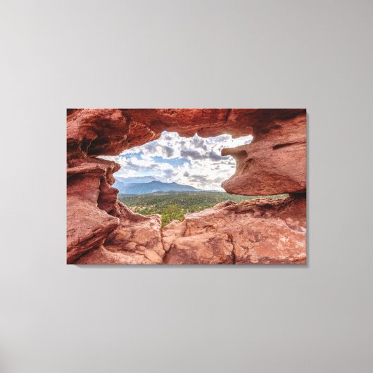 Pikes peak through a Rock Hole Canvas Afdruk (Voorkant)