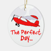 piloot met rood vleugelvliegtuig keramisch ornament (Links)