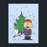 pinda's | KerstCaroling Briefkaart<br><div class="desc">Verspreid feestelijke juichen met dit feestelijke briefkaart met de Peanuts bende vrolijk samen caroling. Perfect voor het verzenden van warme groeten,  uitnodigingen of doordachte notities,  dit prachtige ontwerp vangt de tijdloze charme en geest van de Peanuts-personages tijdens het kerstseizoen.</div>