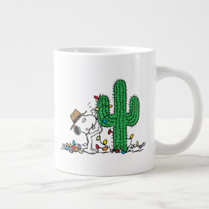 pinda's Spike decoreert voor Kerstmis Grote Koffiekop