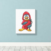 Pinguïn als brandweerman met blusapparaat canvas afdruk (Insitu (Houten vloer))