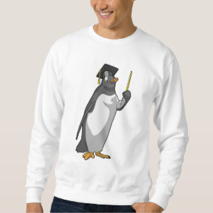 Pinguïn als leraar met wijzer trui