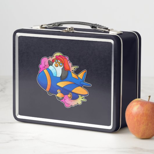 Pinguïn als piloot met vliegtuig (In situ)