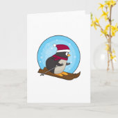 Pinguïn als skiër met skis kaart (Gele Bloem)
