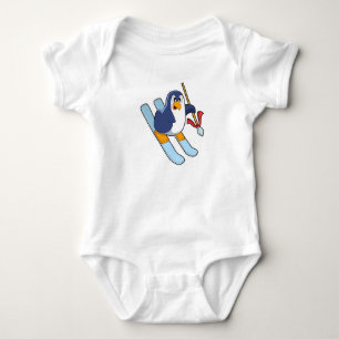 Pinguïn als skiër met skis romper