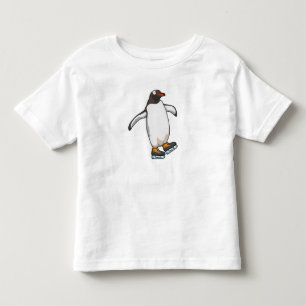 Pinguïn bij ijsschaatsen met ijsschaatsen kinder shirts
