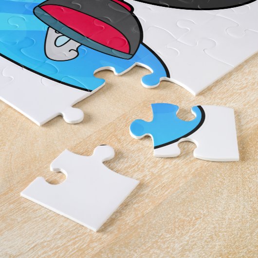 Pinguïn bij ijsschaatsen met ijsschaatsen legpuzzel (Zijkant)