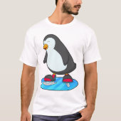Pinguïn bij ijsschaatsen met ijsschaatsen t-shirt (Voorkant)