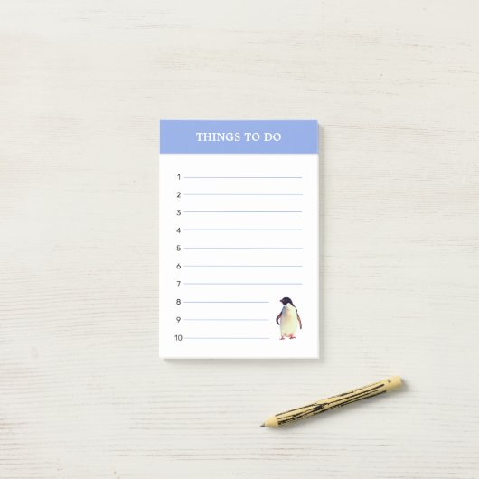 Pinguïn en bewerkbare dingen om opmerkingen na te  post-it® notes (Op bureau)