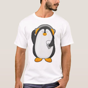 Pinguïn en mobiele telefoon met headset t-shirt