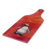 Pinguïn in Santa Hat op rood Snijplank (Hoek)