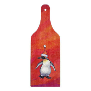 Pinguïn in Santa Hat op rood Snijplank