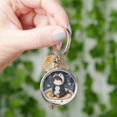 Pinguïn leest met warme kop sleutelhanger (Hand)