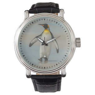 Pinguïn loopt op het strand horloge