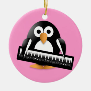Pinguïn met piano keramisch ornament