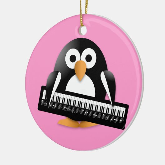 Pinguïn met piano keramisch ornament (Links)