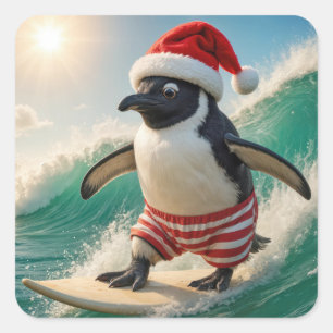 Pinguïn surft op een oceaangolf met Kerstmis Vierkante Sticker