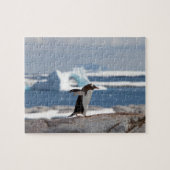 Pinguïn voor een ijsboog legpuzzel (Horizontaal)