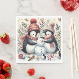 Pinguïns bouwen een sneeuwpop servet