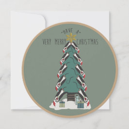 Pinguïns hangen rond de kerstboom feestdagenkaart