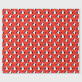 Pinguïns in kerststemming op rood cadeaupapier (Vlak)