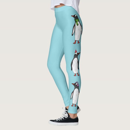 Pinguïns met kerst op blauw leggings (Links)