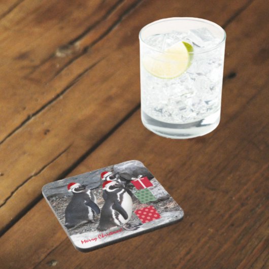 Pinguïns met rode kerstmutsen op vakantie bier onderzetter