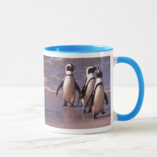 Pinguïns op de Mok van het strand
