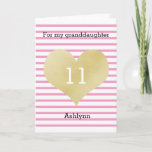 Pink and Gold Heart 11th Birthday Granddaughter Kaart<br><div class="desc">A striped pink and gold 11th birthday card for granddaughter. You can easily personalize the front with her age and name. The inside reads a heartfelt birthday message, which can also be personalized if wanted. The back of this eleventh birthday card also features the gold heart and pink stripes with...</div>