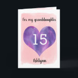 Pink and Purple 15th Birthday Granddaughter Kaart<br><div class="desc">A watercolor pink and purple 15th birthday granddaughter card, which features a watercolor heart against pink watercolor. You can personalize the heart with the age you need and add her name underneath the heart. The inside message can be easily edited if wanted. The back of the card has a smaller...</div>