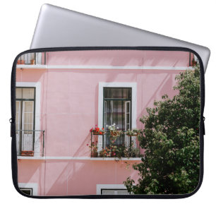 PINK CONCRETE COMMERCIAL BUILLE NEAR GREEN TREE LAPTOP SLEEVE