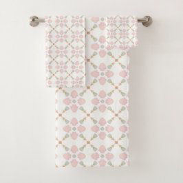 Pink petal and pastel triangle tile pattern on whi bad handdoek