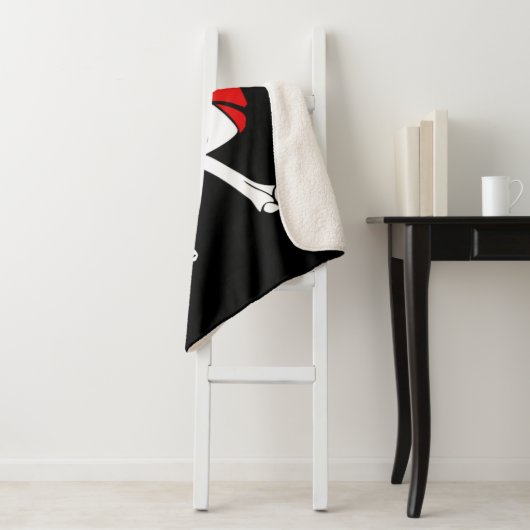 Piraatschedel en kruisbeenderen sherpa deken (In situ)