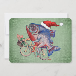 Piranha rijdt op een fiets met een kerstmuts op feestdagenkaart