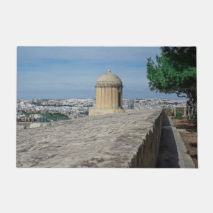 Pistool turret op de oude muren in Valletta, Malta Deurmat