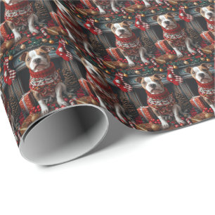 Pitbull-hond met kerstcadeaus bij de open haard cadeaupapier