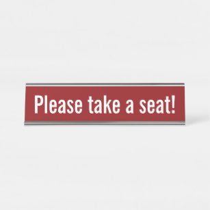 "Plaats alsjeblieft een stoel!" (Witte tekst, rode Bureau Naambordje