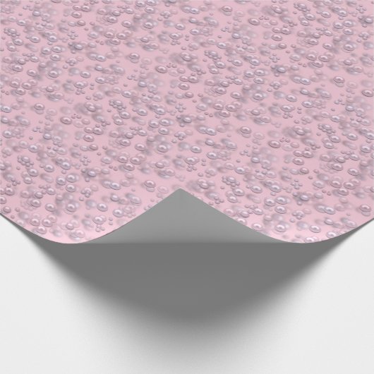 Plaatsers van wit-roze parels op roze fluweel cadeaupapier (Hoek)