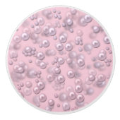 Plaatsers van wit-roze parels op roze fluweel keramische knop (Voorkant)