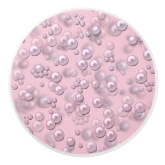 Plaatsers van wit-roze parels op roze fluweel keramische knop (Voorkant)