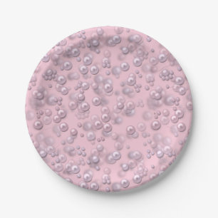 Plaatsers van wit-roze parels op roze fluweel papieren bordje