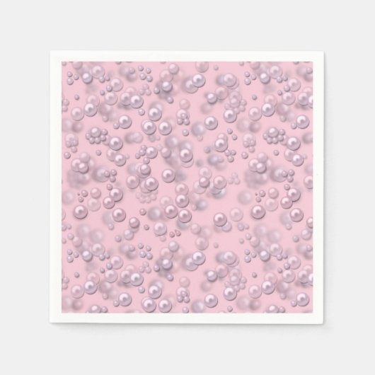 Plaatsers van wit-roze parels op roze fluweel servet (Voorkant)