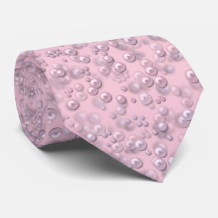 Plaatsers van wit-roze parels op roze fluweel stropdas