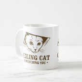 Plafondkat kijkt naar je koffiemok (Voorkant links)